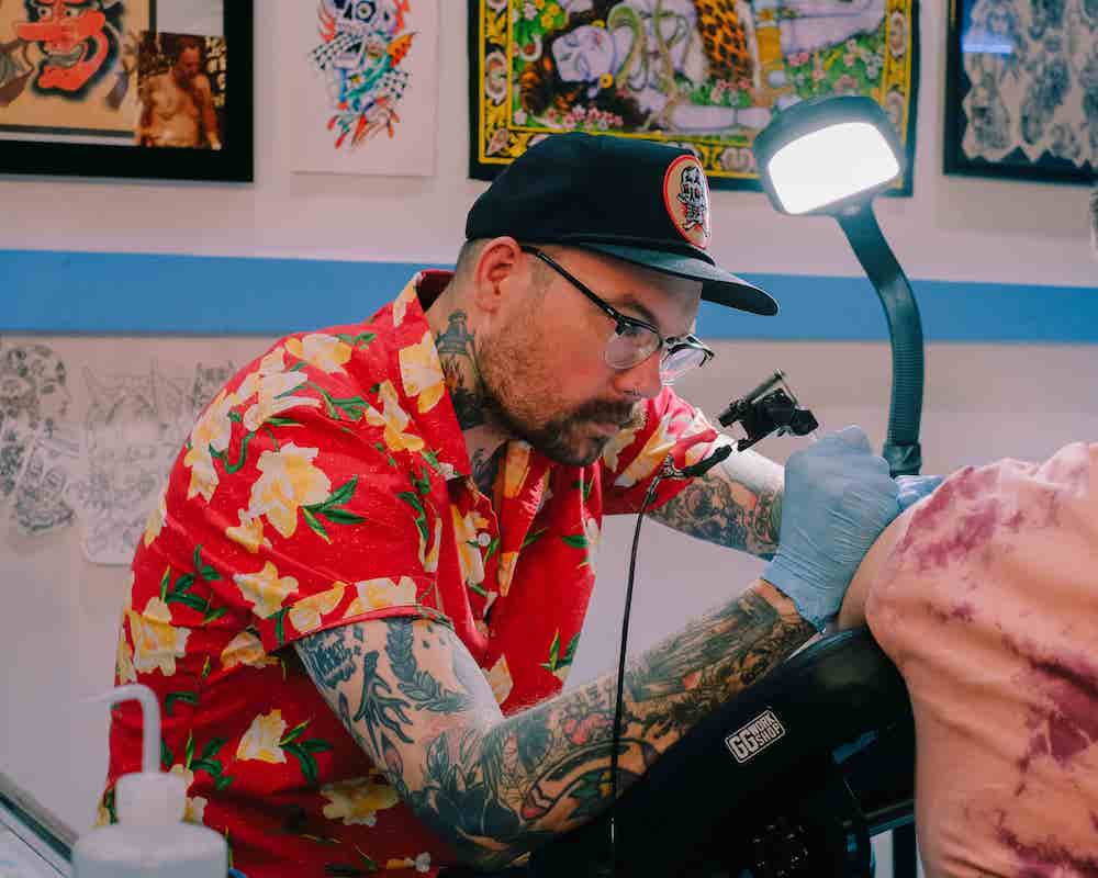 Danny doing a tattoo